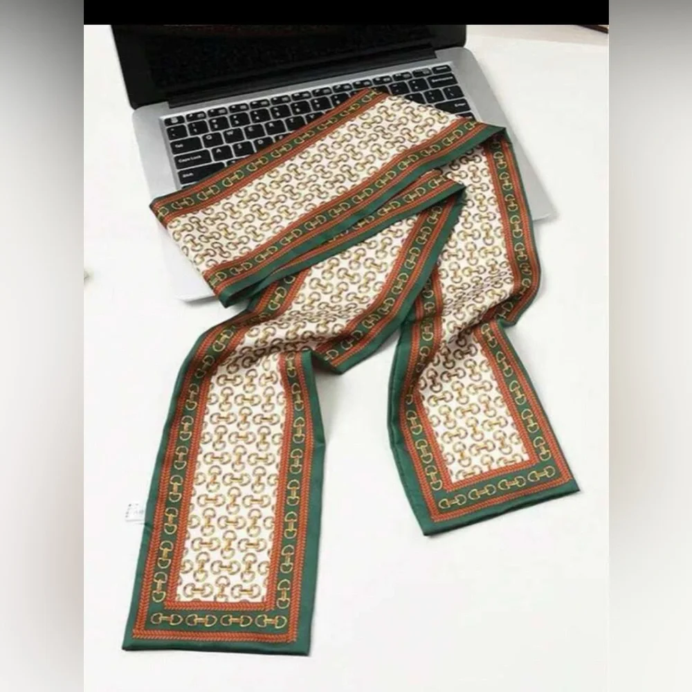 Elegant Cream Patterned Silk Scarf with Green Trim